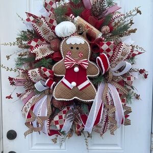 Adorable Red and White Gingerbread Holiday Wreath. Aprox 26” wide